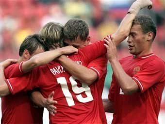 Игроки сборной России в матче с Польшей. Фото AFP